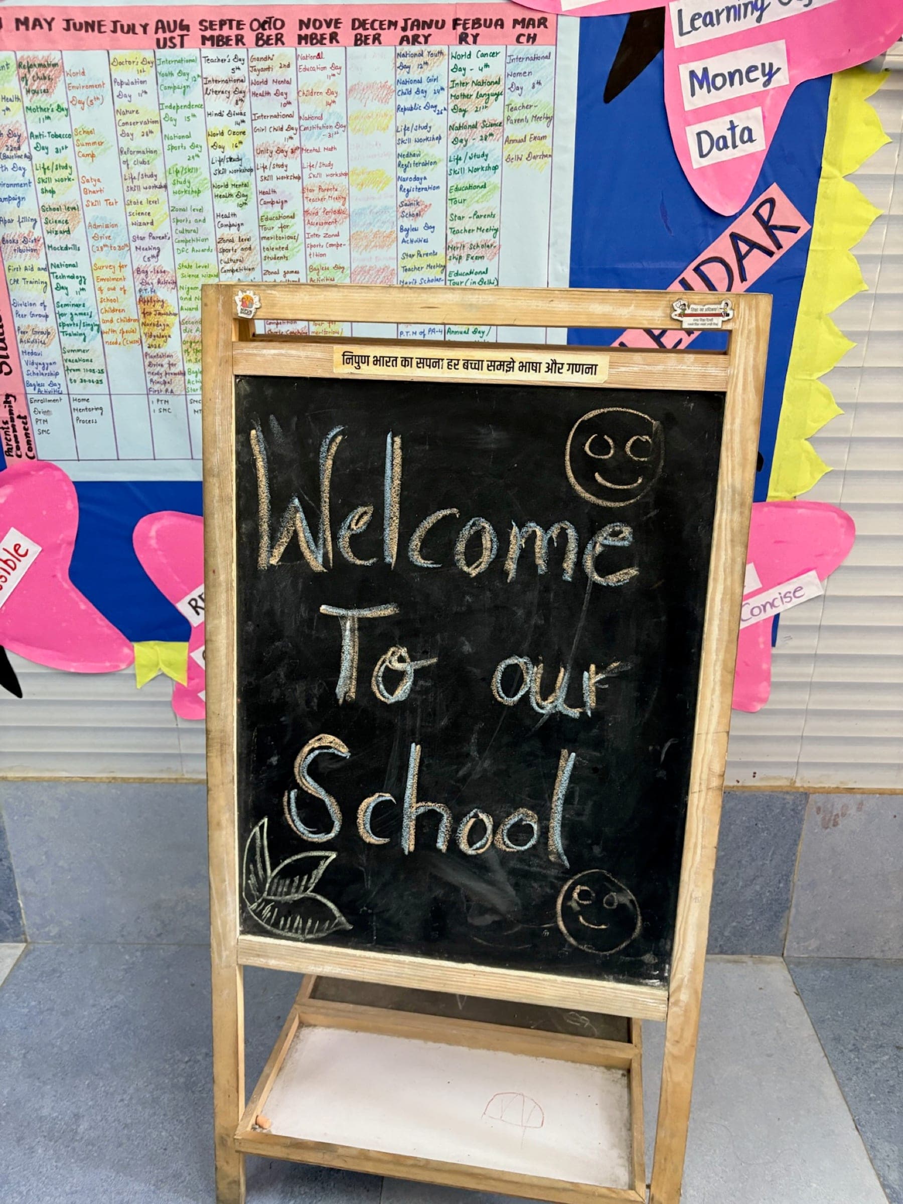 Chalkboard reading 'Welcome To our School' - charming scene-setting detail
