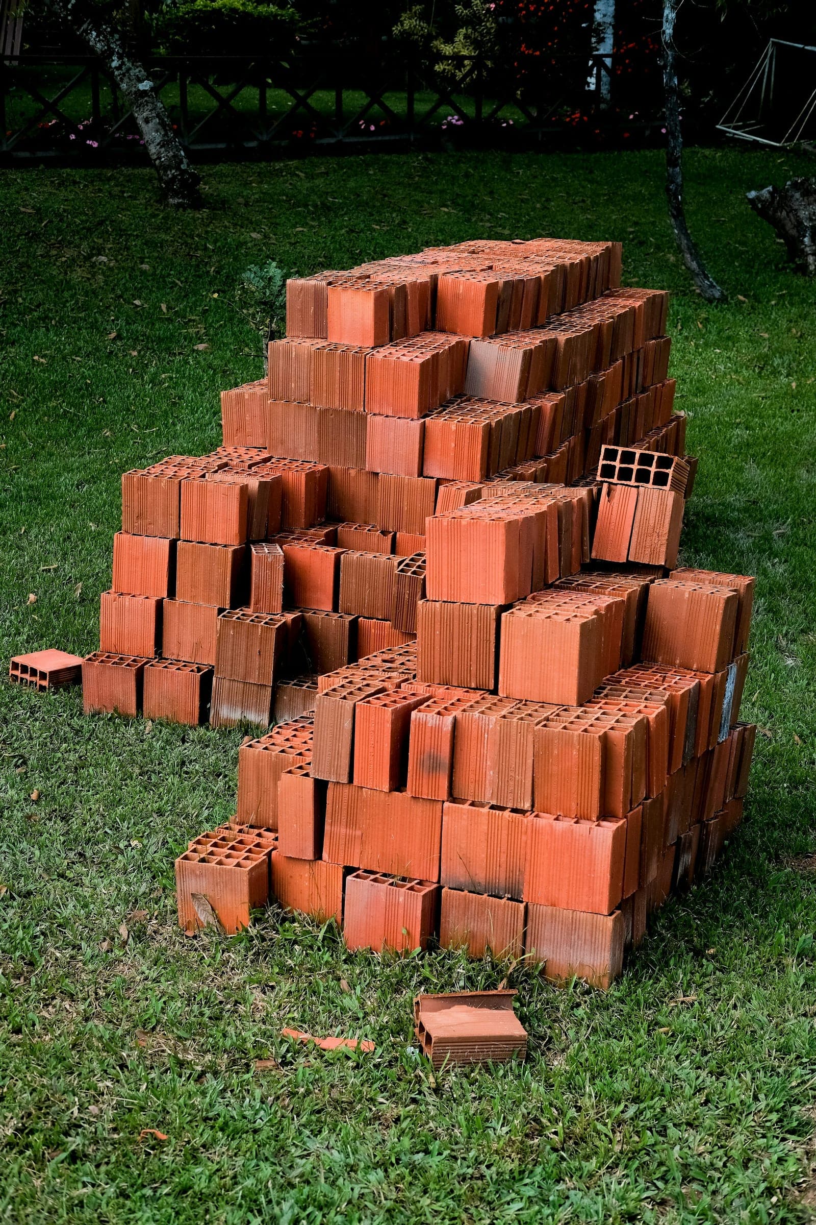 A lot of stacked orange bricks